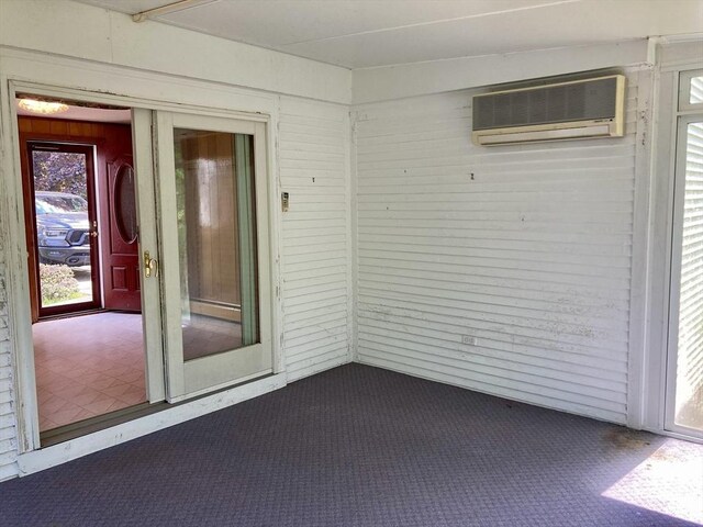 68 Briarbrook Dr, Seekonk, MA 02771 - unfurnished sunroom with a wall mounted AC and healthy amount of natural light