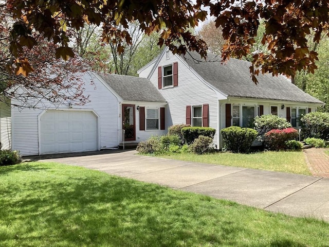 68 Briarbrook Dr, Seekonk, MA 02771 - view of front of home with an attached garage, asphalt driveway, a shingled roof, and a front lawn