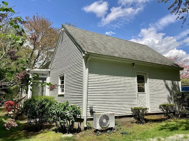 68 Briarbrook Dr, Seekonk, MA 02771 - view of side of home with ac unit and roof with shingles