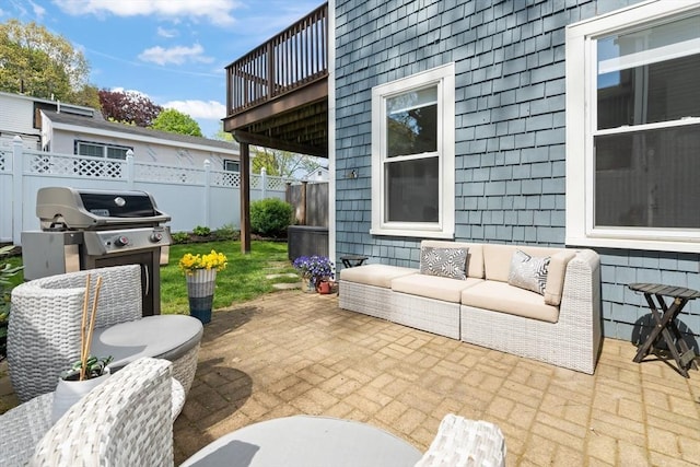 4 Arlington St Unit A, Newburyport, MA 01950 - view of patio featuring fence, an outdoor living space, and grilling area