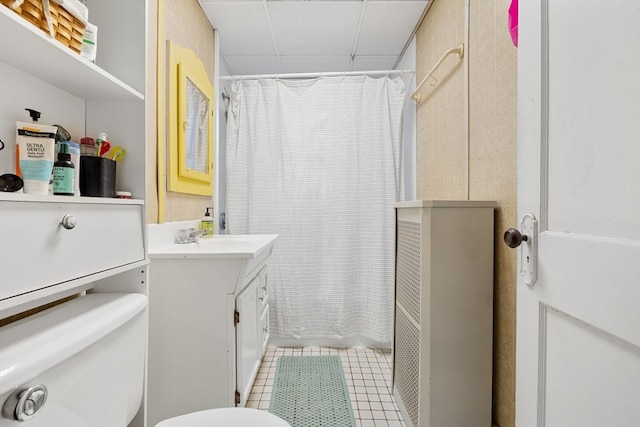 bathroom featuring vanity, toilet, and tile patterned floors