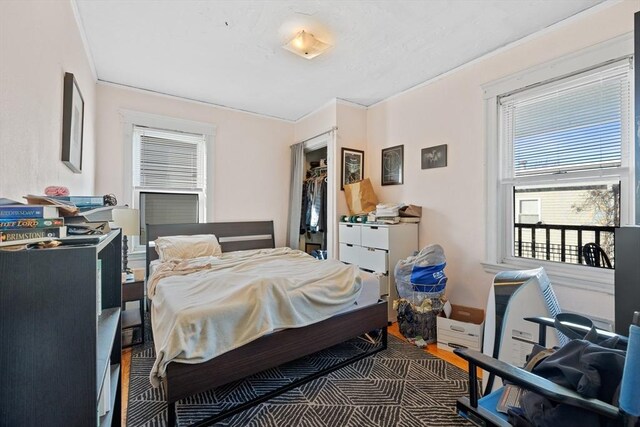 bedroom featuring wood finished floors