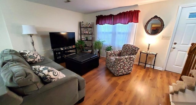 728 Auburn St Unit F8, Whitman, MA 02382 - living room with wood finished floors and baseboards