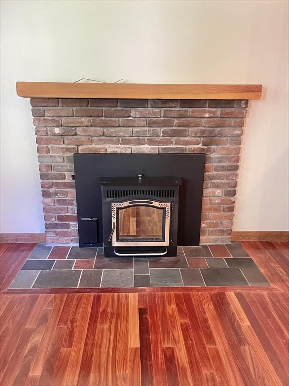 2 Bushy Ln, Rutland, MA 01543 - detailed view of wood finished floors and baseboards