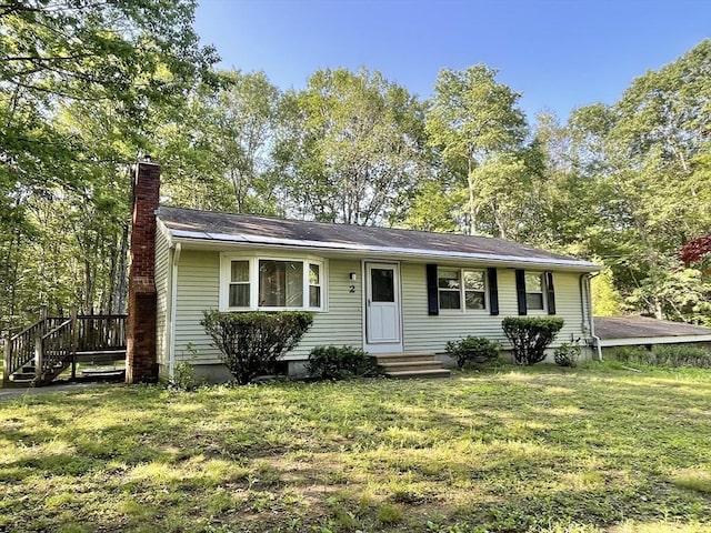 2 Bushy Ln, Rutland, MA 01543 - view of front of home with a chimney and a front yard