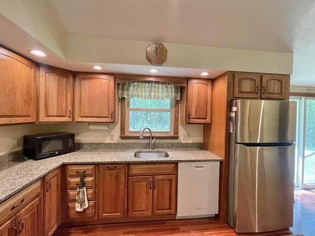 2 Bushy Ln, Rutland, MA 01543 - kitchen with freestanding refrigerator, white dishwasher, black microwave, healthy amount of natural light, and recessed lighting