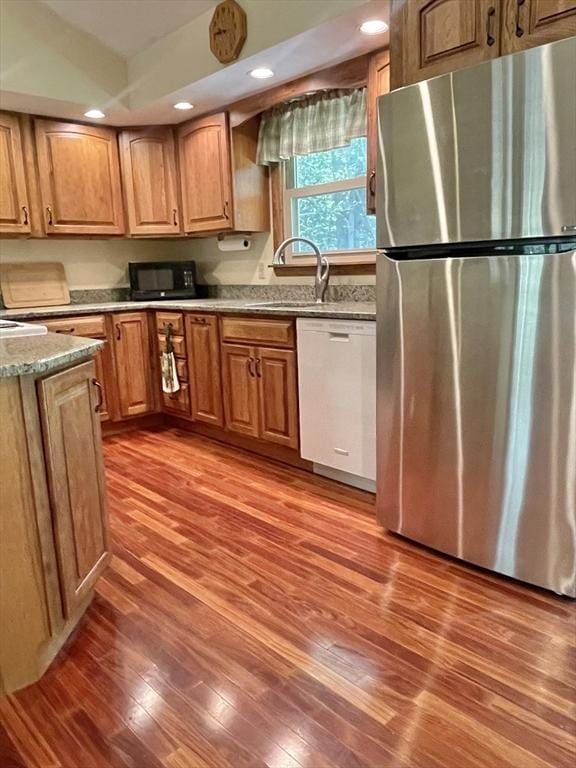 2 Bushy Ln, Rutland, MA 01543 - kitchen featuring freestanding refrigerator, white dishwasher, black microwave, wood finished floors, and recessed lighting