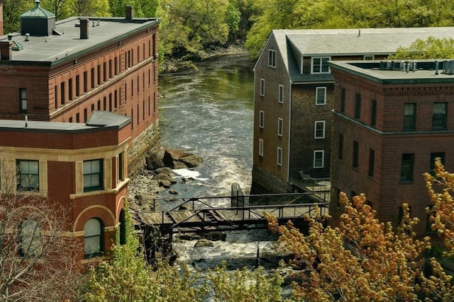 view of side of property with a water view
