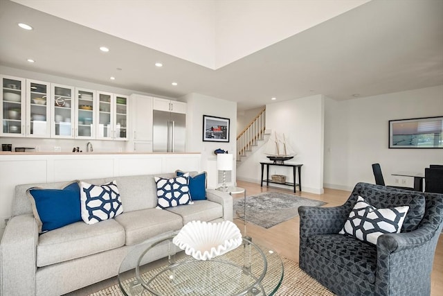 266 Merrimac St Unit F, Newburyport, MA 01950 - living area featuring light wood-style flooring, recessed lighting, stairs, and baseboards
