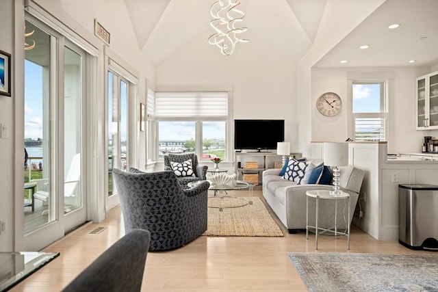 266 Merrimac St Unit F, Newburyport, MA 01950 - living room featuring light wood-type flooring, lofted ceiling, and recessed lighting