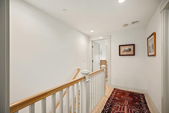 266 Merrimac St Unit F, Newburyport, MA 01950 - hallway featuring an upstairs landing, light wood-type flooring, recessed lighting, and baseboards