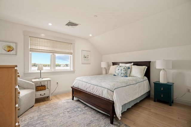 266 Merrimac St Unit F, Newburyport, MA 01950 - bedroom with wood finished floors, vaulted ceiling, baseboards, and recessed lighting