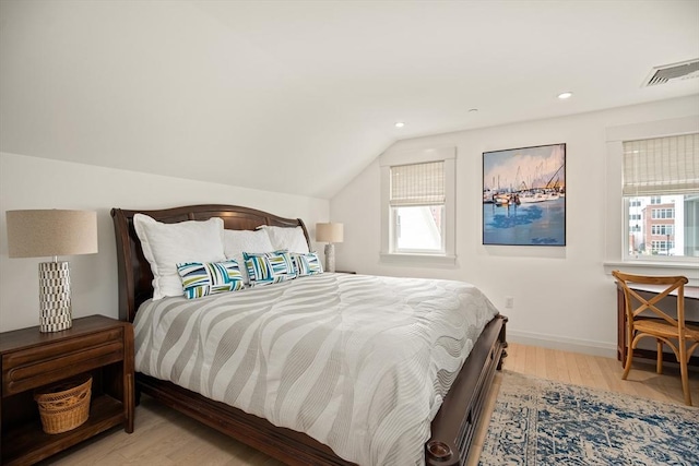 266 Merrimac St Unit F, Newburyport, MA 01950 - bedroom with wood finished floors, multiple windows, lofted ceiling, recessed lighting, and baseboards
