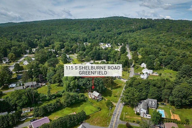 115 S Shelburne Rd, Greenfield, MA 01301 - aerial overview of property's location with a forest