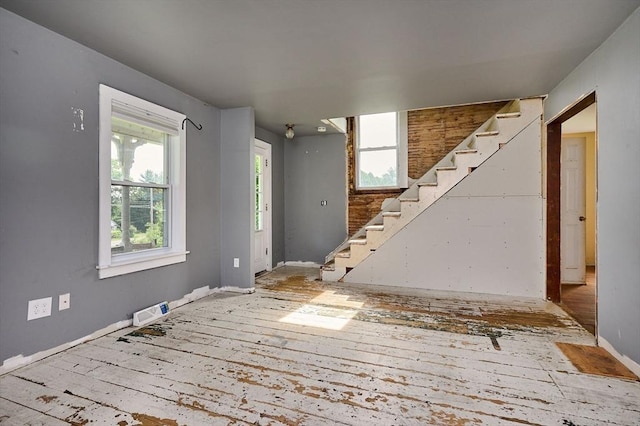 115 S Shelburne Rd, Greenfield, MA 01301 - unfurnished living room with stairway