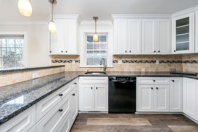 kitchen featuring dark hardwood / wood-style flooring, white cabinets, sink, decorative light fixtures, and dishwasher