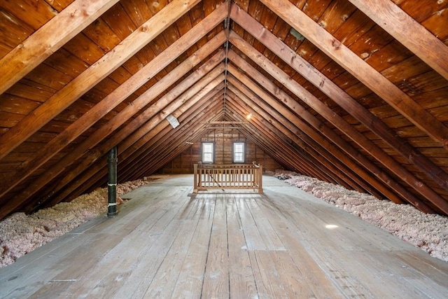 attic featuring an upstairs landing
