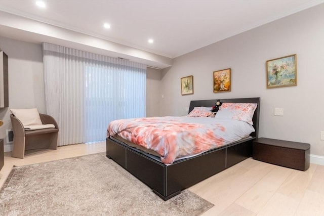 bedroom featuring recessed lighting and baseboards