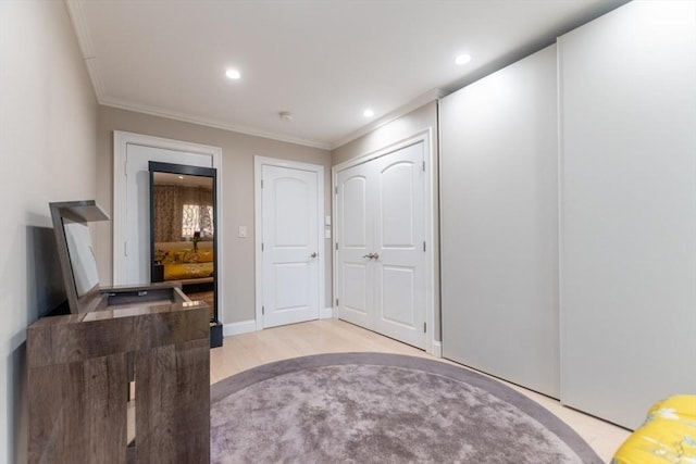 interior space with recessed lighting, light wood-style floors, and crown molding