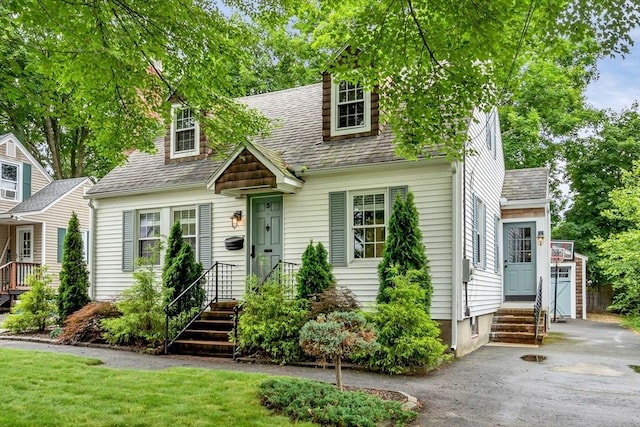 5 Vandergrift St, Lawrence, MA 01843 - new england style home with a shingled roof and asphalt driveway
