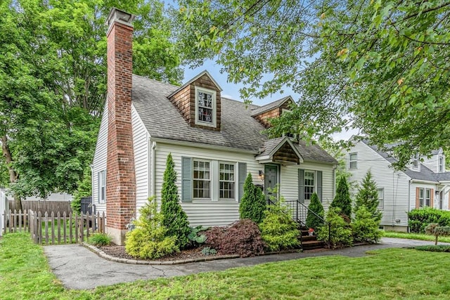 5 Vandergrift St, Lawrence, MA 01843 - cape cod-style house with a chimney and a shingled roof