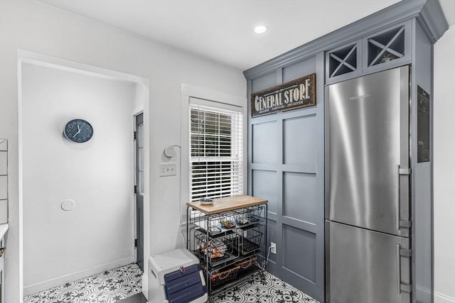 5 Vandergrift St, Lawrence, MA 01843 - kitchen with freestanding refrigerator, gray cabinetry, light countertops, and recessed lighting
