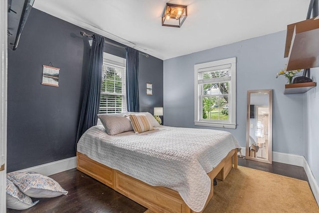 5 Vandergrift St, Lawrence, MA 01843 - bedroom with dark wood-type flooring and multiple windows