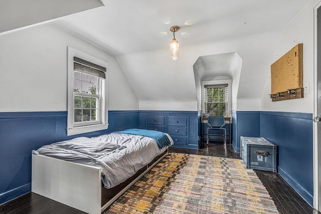 5 Vandergrift St, Lawrence, MA 01843 - bedroom featuring lofted ceiling, wainscoting, multiple windows, and wood finished floors