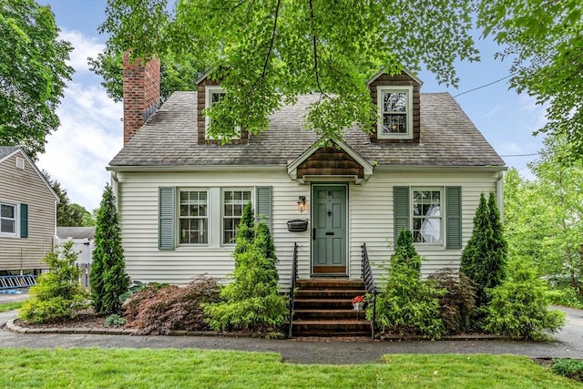 5 Vandergrift St, Lawrence, MA 01843 - cape cod-style house featuring a chimney and entry steps