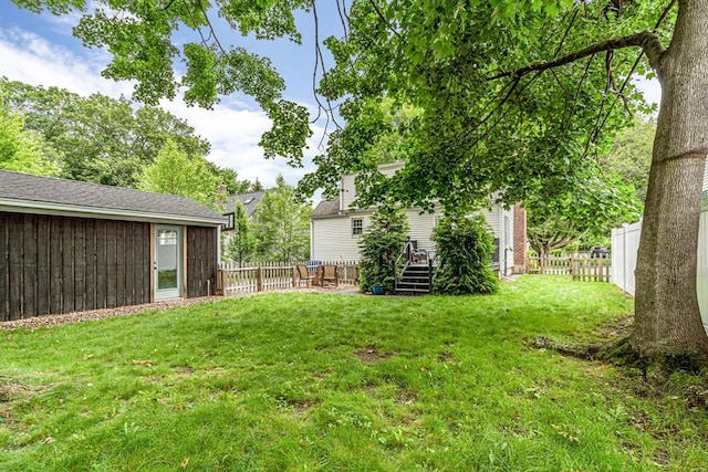 5 Vandergrift St, Lawrence, MA 01843 - fenced backyard with a wooden deck