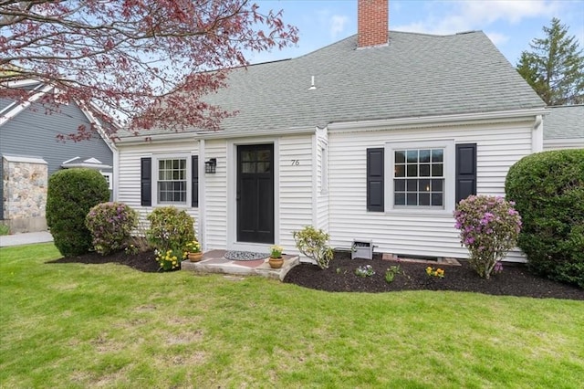76 Union St, Natick, MA 01760 - view of front facade with a front lawn, roof with shingles, and a chimney