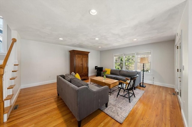 76 Union St, Natick, MA 01760 - living area featuring stairs, recessed lighting, baseboards, and light wood-type flooring