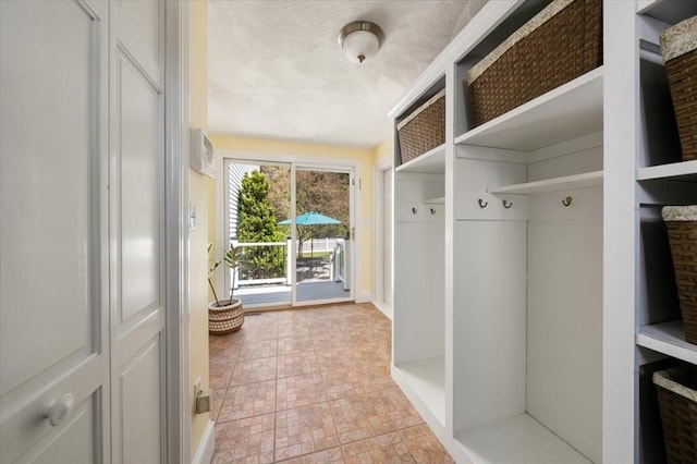 76 Union St, Natick, MA 01760 - mudroom featuring light tile patterned flooring