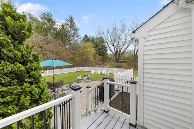 76 Union St, Natick, MA 01760 - deck with a fenced backyard, a patio, and a yard