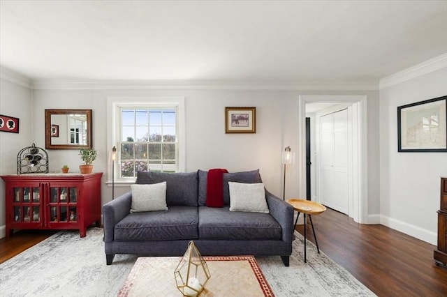 76 Union St, Natick, MA 01760 - living room featuring crown molding, baseboards, and wood finished floors