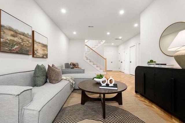 living room with light parquet floors