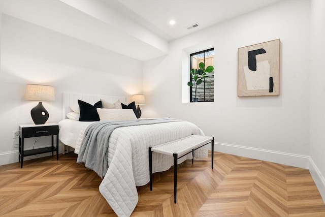 bedroom with parquet flooring