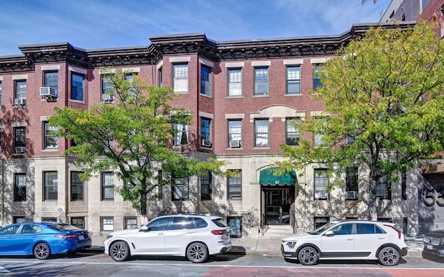 view of building exterior with cooling unit