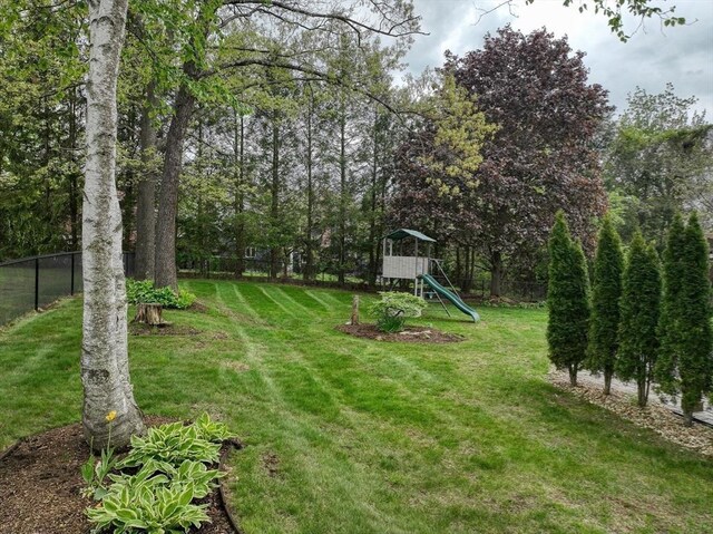 view of yard with a playground