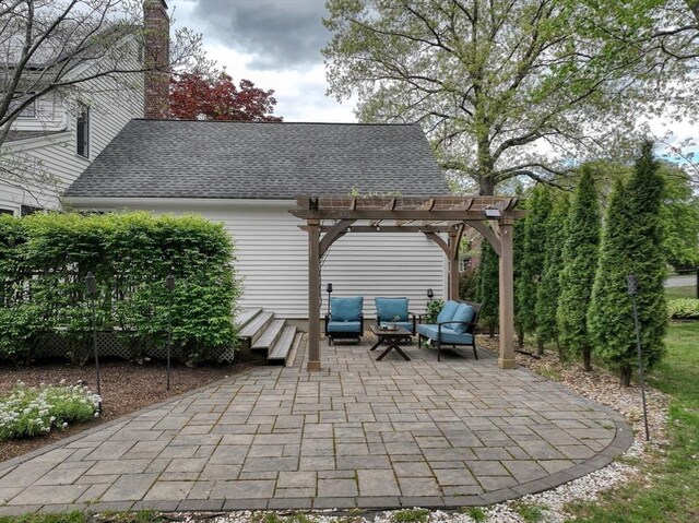 view of patio featuring a pergola