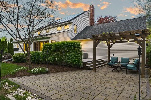 view of patio / terrace featuring a pergola and an outdoor living space