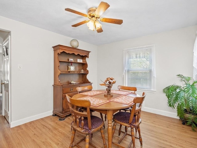 108 Edward Rd, Watertown, MA 02472 - dining space featuring light wood-style floors, ceiling fan, and baseboards