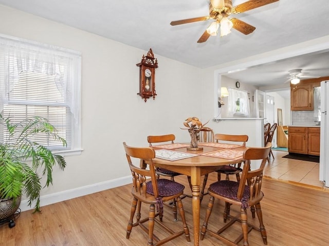108 Edward Rd, Watertown, MA 02472 - dining room featuring ceiling fan, light wood finished floors, and baseboards