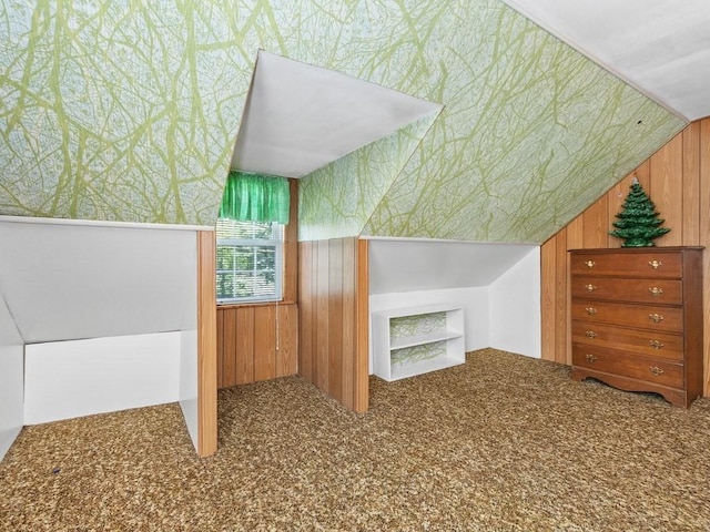108 Edward Rd, Watertown, MA 02472 - additional living space featuring carpet floors, wooden walls, vaulted ceiling, and wallpapered walls