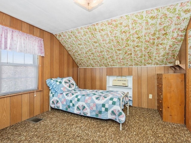 108 Edward Rd, Watertown, MA 02472 - bedroom with carpet floors, wood walls, and lofted ceiling