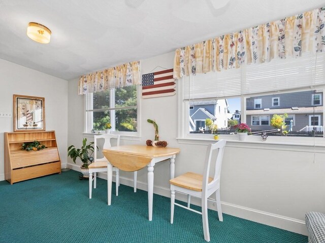 108 Edward Rd, Watertown, MA 02472 - dining area featuring carpet flooring and baseboards