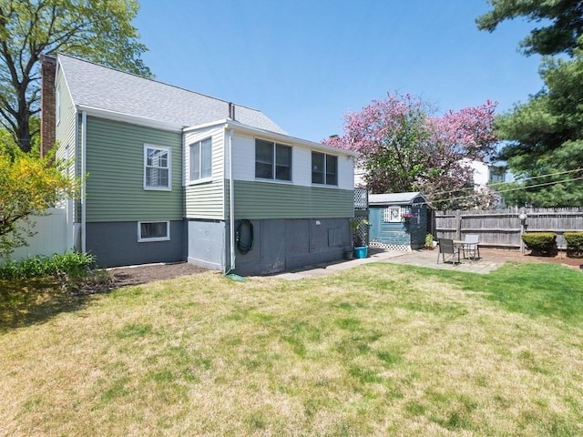 108 Edward Rd, Watertown, MA 02472 - rear view of property featuring roof with shingles