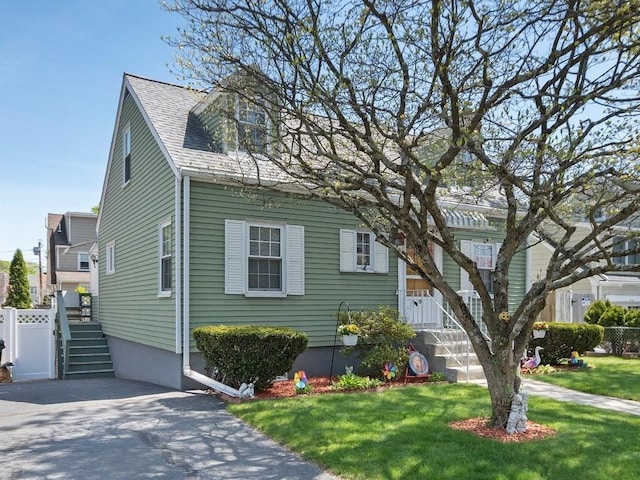 108 Edward Rd, Watertown, MA 02472 - new england style home featuring stairway and a shingled roof
