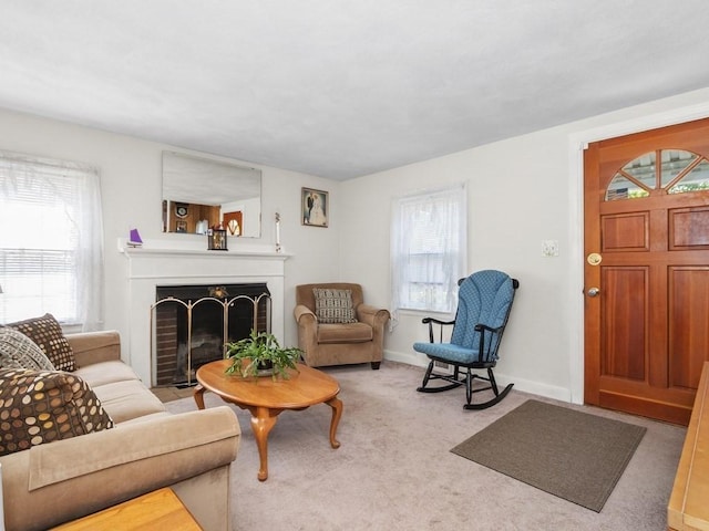 108 Edward Rd, Watertown, MA 02472 - living room with plenty of natural light, light carpet, a fireplace with flush hearth, and baseboards