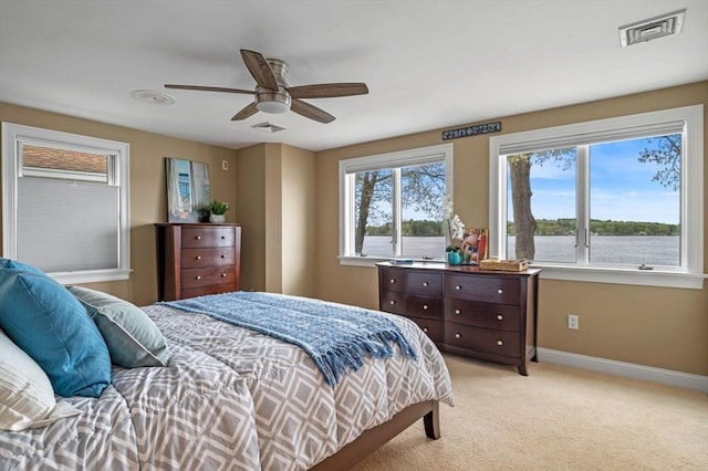43 W Shore Rd, Merrimac, MA 01860 - bedroom with light colored carpet, baseboards, and a ceiling fan